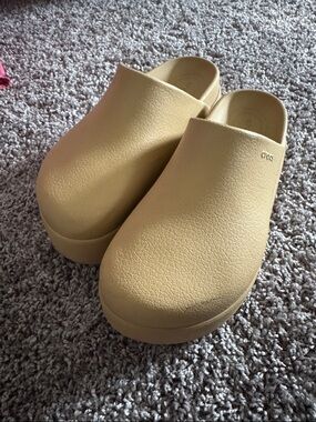 CROCS Elevated Platform Clogs in Tan